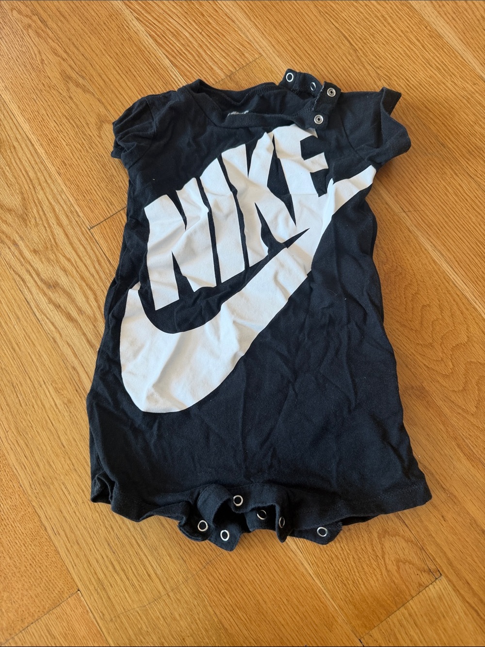 Nike Black Baby One-Piece Romper with White Logo